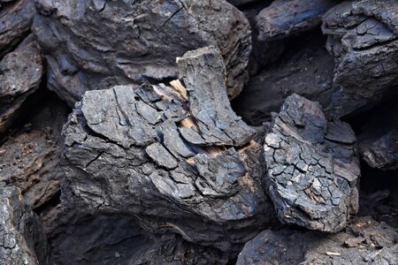 A pile of dry lignite coal ready for heating during winterの写真素材