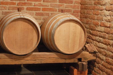 Two wine barrels in cellarの写真素材