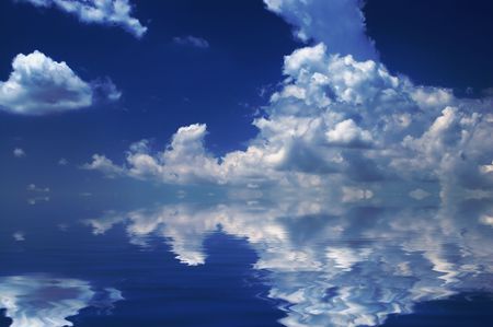 Cloudscape mirroring in water - abstract backgroundの写真素材