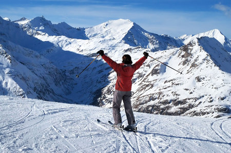 Female skier expressing joy