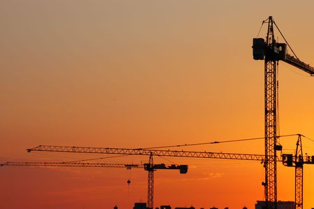 Construction site - cranes at dawn (landscape version)の写真素材