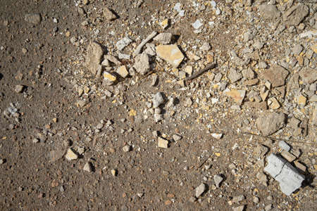 broken plaster fallen off from the facade of the building. Architectural repairs. Construction debris on the floor.の写真素材