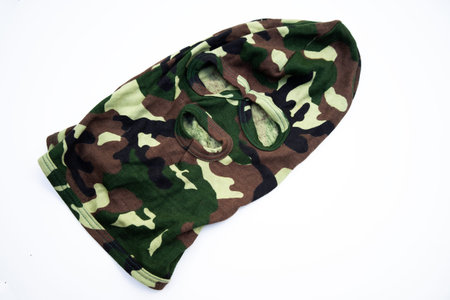 Balaclava of protective color on white isolate. The mask on the head is made of fabric.の写真素材
