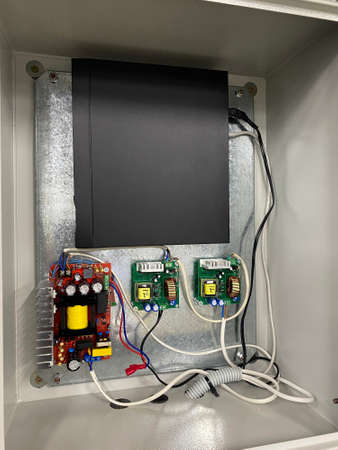 Installing a hard drive in a drawer with electrics for recording from video cameras.の写真素材