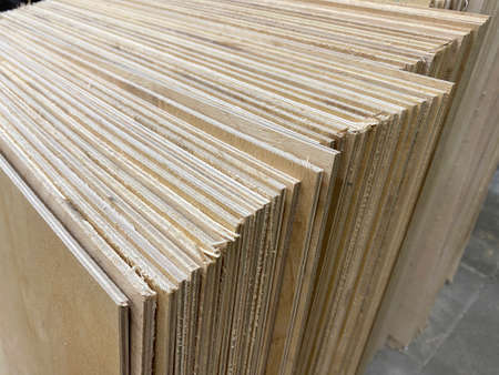 Wooden plywood in stock.Sale of plywood in production.の写真素材