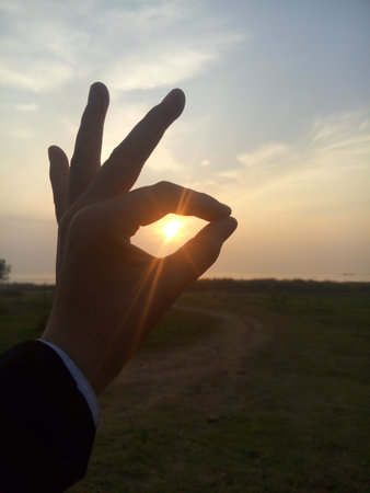 Closeup of a okay gestureの写真素材