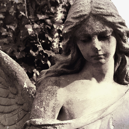 Figure of angel as a symbol of love, kindness, and sufferingの写真素材