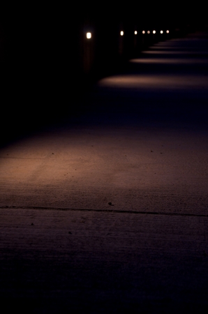 row of spotlights at nightの写真素材