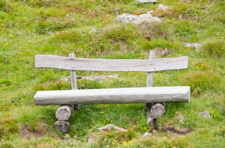 wooden bench in the alpsの写真素材