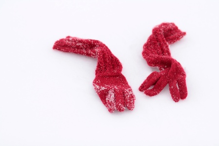 red gloves on the white snowの写真素材