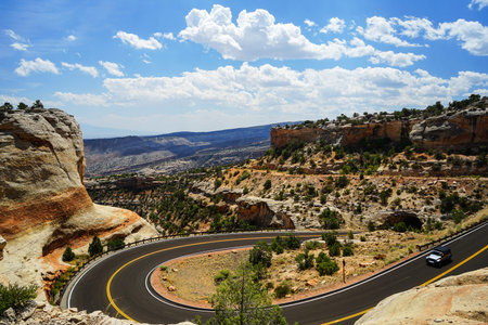 A Suv Car on road in the Canyon of Colorado, America