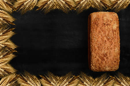 testy wheat bread rusty background with space for textの写真素材