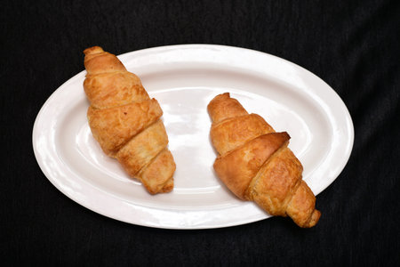 fresh bread in white plate on table .の写真素材