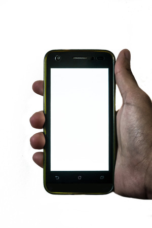 Man hand hanging a mobile phone on isolated backgroundの写真素材