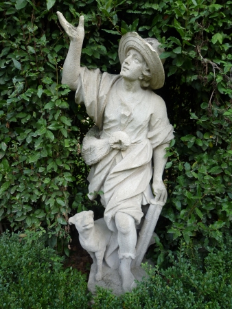 Ancient statue of a young man rapresenting November in Esedra Arborea of Villa Sciarra in Rome, Italyの写真素材