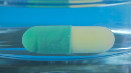 Effervescent pills dissolving in water. Medicine concept. Macro Shotの写真素材