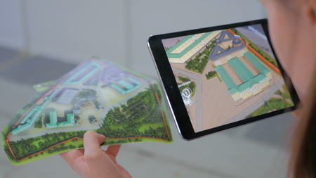 NIZHNIY NOVGOROD, RUSSIA - JANUARY 28, 2017: Exhibition of modern technologies. Tablet augmented reality app. Future and technology conceptのeditorial素材