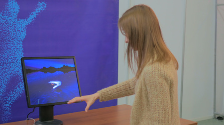 Woman playing motion capture video game. Future and technology conceptの写真素材
