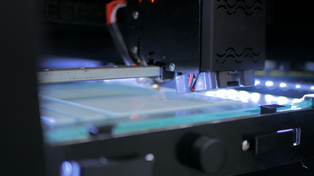 Three dimensional printing machine. 3D printer during workの写真素材