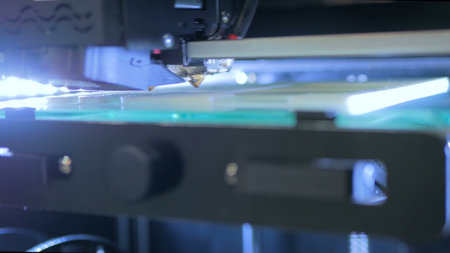 Three dimensional printing machine. 3D printer during workの写真素材