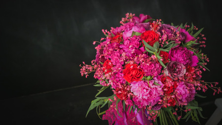 Beautiful wedding bouquet on the black background. Floristry and handmade conceptの写真素材