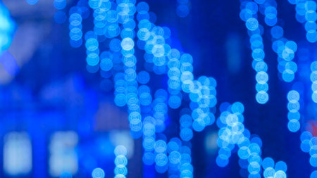 Abstract defocused blue lighting bokeh at futuristic modern technology exhibition
