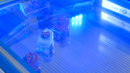 MOSCOW, RUSSIA - July 30, 2018: Robostation - future exhibition. Small cute robots playing soccer at technology exhibition. Future and robotic conceptのeditorial素材