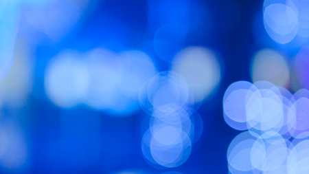 Abstract light bokeh background at technology exhibitionの写真素材