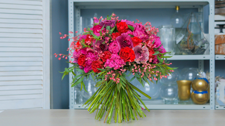 Beautiful wedding bouquet at workshop, flower shop. Floristry and handmade conceptの写真素材