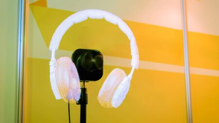 MOSCOW, RUSSIA - OCTOBER 12, 2018 - 3D led holo fan advertising projector device displays floating hologram projection of headphones. Future, sci-fi, marketing and digital conceptのeditorial素材