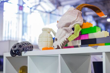 MOSCOW, RUSSIA - OCTOBER 12, 2018: 3D Print Expo - plastic models at modern technology exhibition. 3D printing, additive technologies and futuristic conceptのeditorial素材