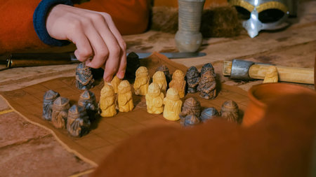 Man in russian ethnic suit playing board game like chess. Folk, competition and traditional concept