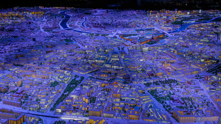Interactive 3D architectural model of Moscow with colorful blue and yellow dynamic illumination. Technology, architecture and urbanization conceptの写真素材