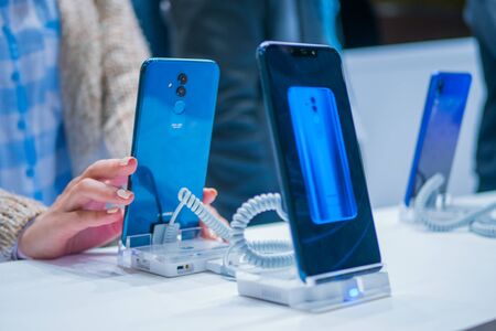 MOSCOW, RUSSIA - March 1, 2019: New models of Huawei smartphone in electronic shop, store. Prototype, consumerism, entertainment and new technology conceptのeditorial素材