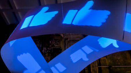 MOSCOW, RUSSIA - AUGUST 01, 2019: Media Exhibition. Interactive installation - moving thumb up and thumbs down signal - like/dislike. Social media, online technology, digital, contemporary art conceptのeditorial素材