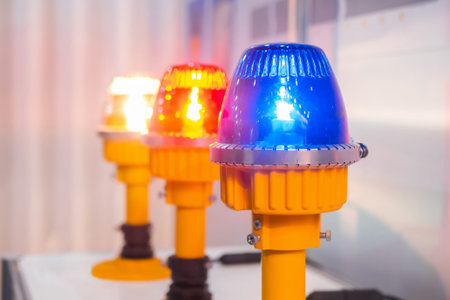 Close up of alarm lamp signal warning flashing lights for industrial machinery at emergency, support...