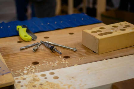 Set of carving tools, carpenter equipment on table in workshop. Carpentry, woodwork, craftsmanship,...