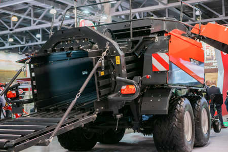 MOSCOW, RUSSIA - JUNE 10, 2020: Farming Exhibition. Back view of multifunctional agricultural machine KUHN SB 1290 designed to produce bales at trade show, marketのeditorial素材