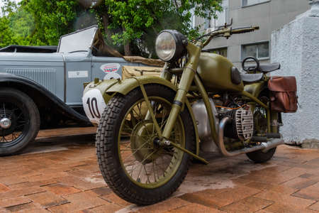 NIZHNY NOVGOROD, RUSSIA - JUNE 15, 2020: Classic Soviet Car Exhibition. Customized green military motorcycle. Historical, retro, vintage and nostalgia conceptのeditorial素材
