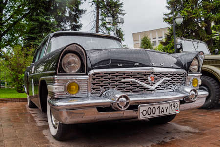 NIZHNY NOVGOROD, RUSSIA - JUNE 15, 2020: Classic Soviet Car Exhibition. Customized black GAZ-13 Chaika. Historical, retro, vintage and nostalgia conceptのeditorial素材