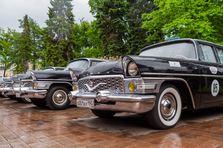 NIZHNY NOVGOROD, RUSSIA - JUNE 15, 2020: Classic Soviet Car Exhibition. Customized black GAZ-13 Chaika. Historical, retro, vintage and nostalgia conceptのeditorial素材