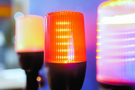 Close up of alarm lamp signal warning flashing lights for industrial machinery at emergency, support...
