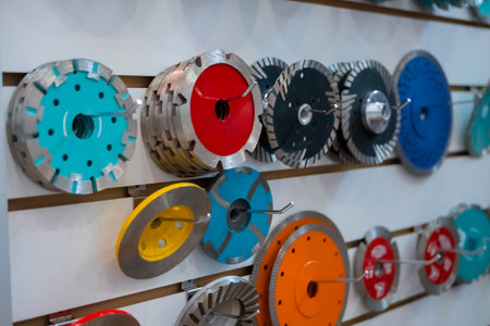 Diamond carving discs fot stone circular saw machine on counter for sale at market. Industry,...