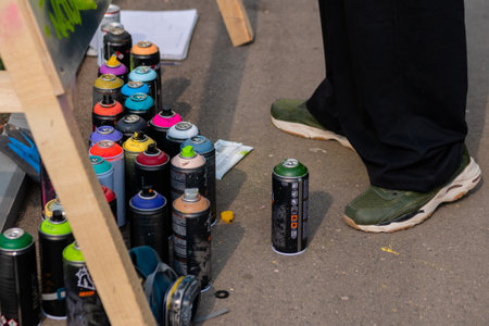 MOSCOW, RUSSIA - APRIL 5, 2019: Summer Graffiti Festival. Set of used spray paint cans - different colors. Urban culture, freedom, creativity and street art conceptのeditorial素材
