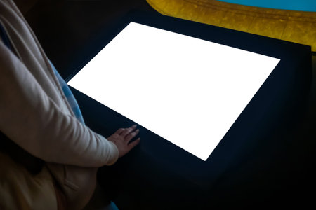 White screen, mock up, future, copyspace, template, technology concept. Woman looking at blank...