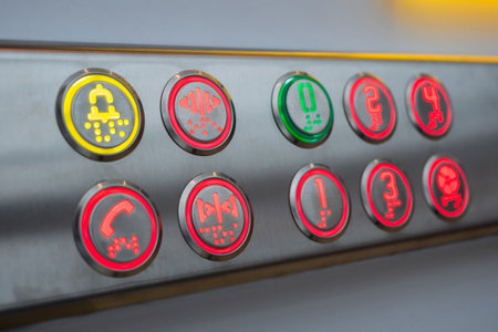 Elevator floor buttons on lift control panel at mall, hotel or business center - close up view. Technology and transportation conceptの写真素材