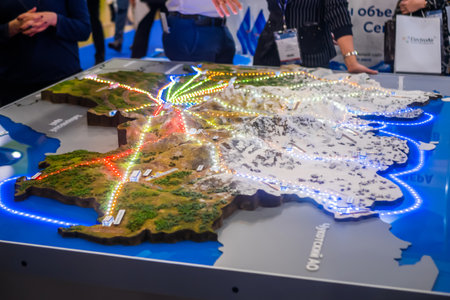 MOSCOW, RUSSIA - JUNE 01, 2019: Aviation exhibition. 3D architectural model of landscape map with airports and aircraft routing - close up view. Dynamic light illuminationのeditorial素材