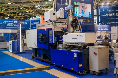 MOSCOW, RUSSIA - JUNE 05, 2019: Plastic exhibition. Haitian electric hydraulic injection molding machine at trade show. Technology, production, manufacturing, industrial, automatic equipment conceptのeditorial素材