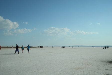 People are walking on the salt lake.の写真素材