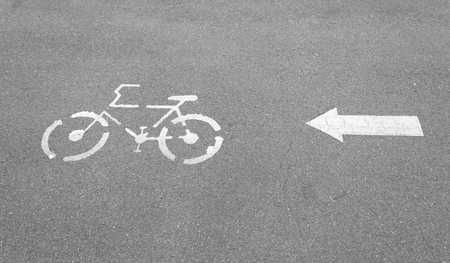 Bicycle Lane sign and arrow on concrete texture roadの写真素材